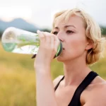 1800ss_thinkstock_rf_woman_drinking_water